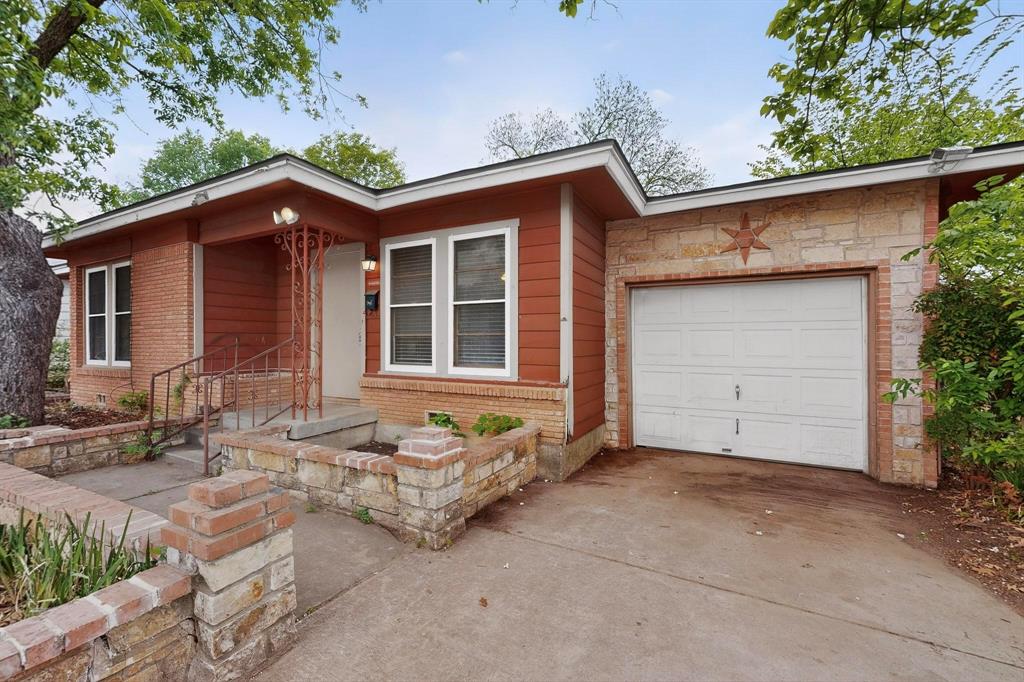 4508 Rutland Avenue Fort Worth, TX 76133 - Photo 5 of 36 a front view of a house with garden