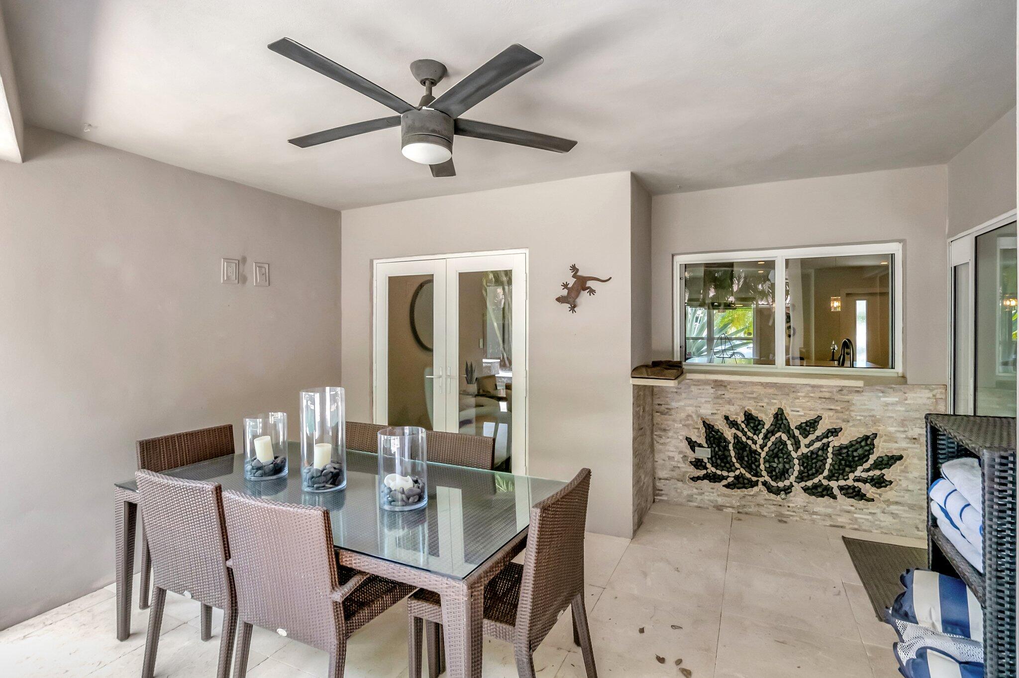 855 Berkley Street Boca Raton, FL 33487 - Photo 27 of 34 a dining room with furniture and window