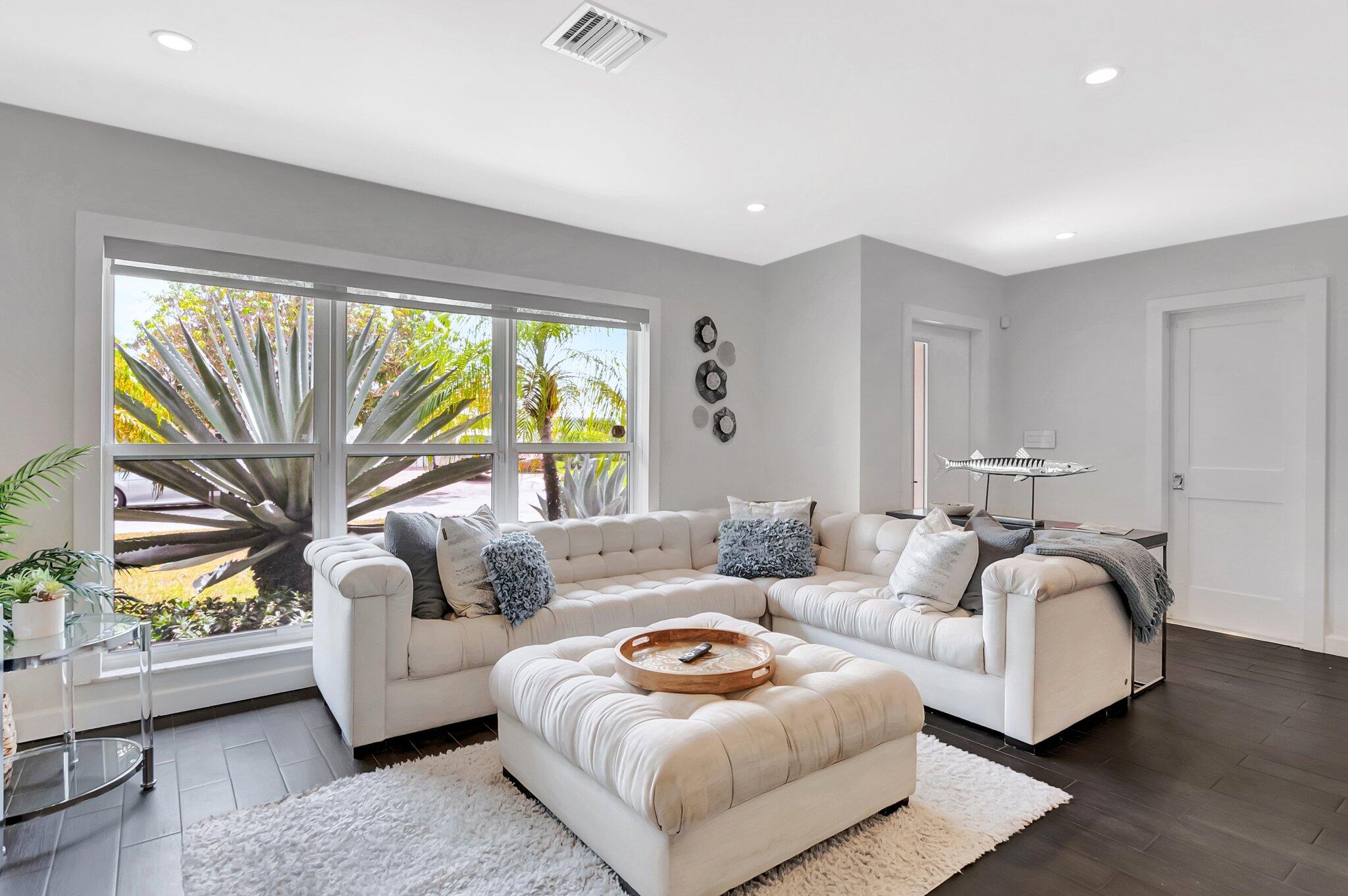 855 Berkley Street Boca Raton, FL 33487 - Photo 4 of 34 a living room with furniture and a large window