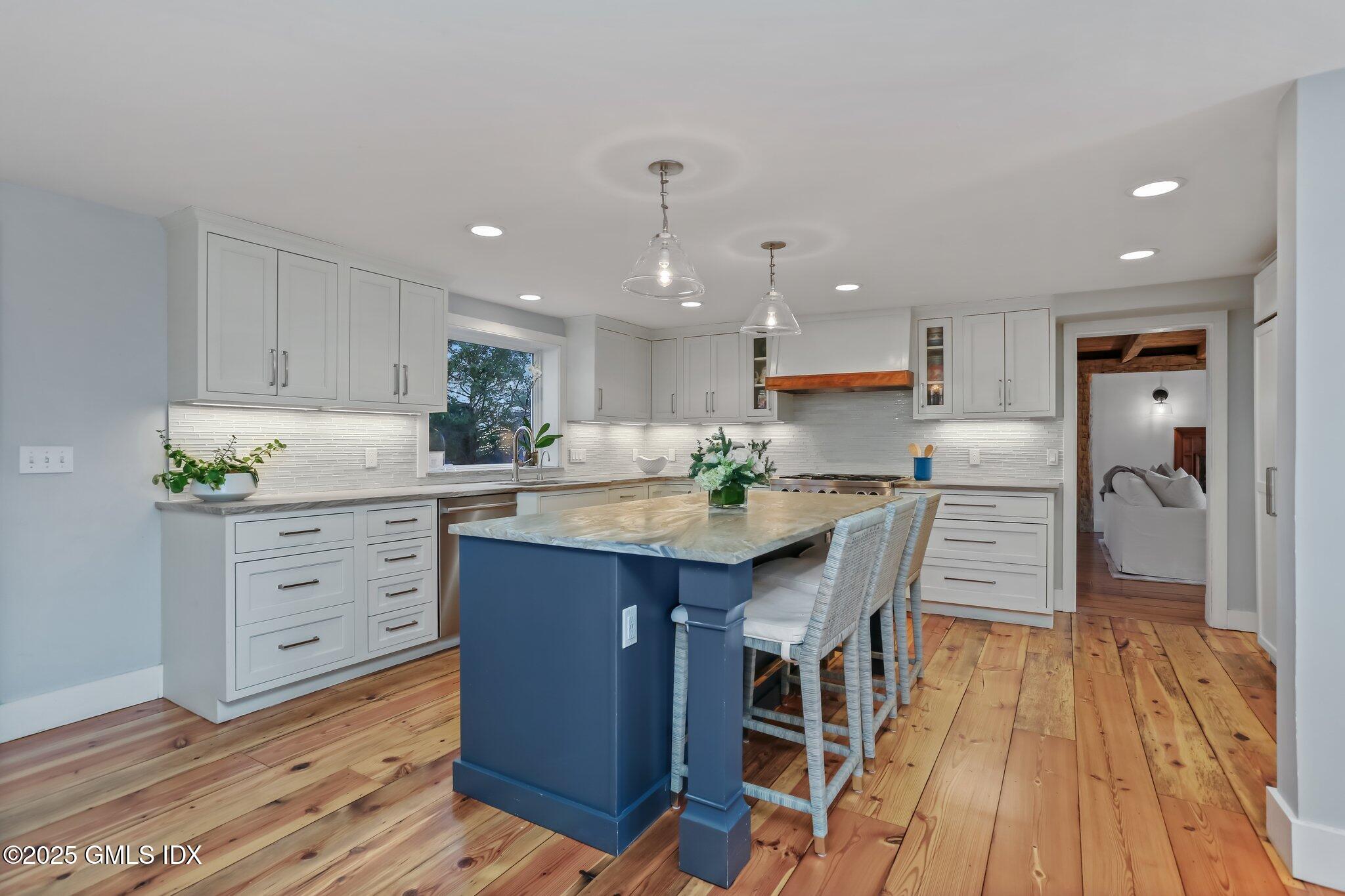 3 Cat Rock Road Cos Cob, CT 06807 - Photo 10 of 49 a kitchen with white cabinets and counter space