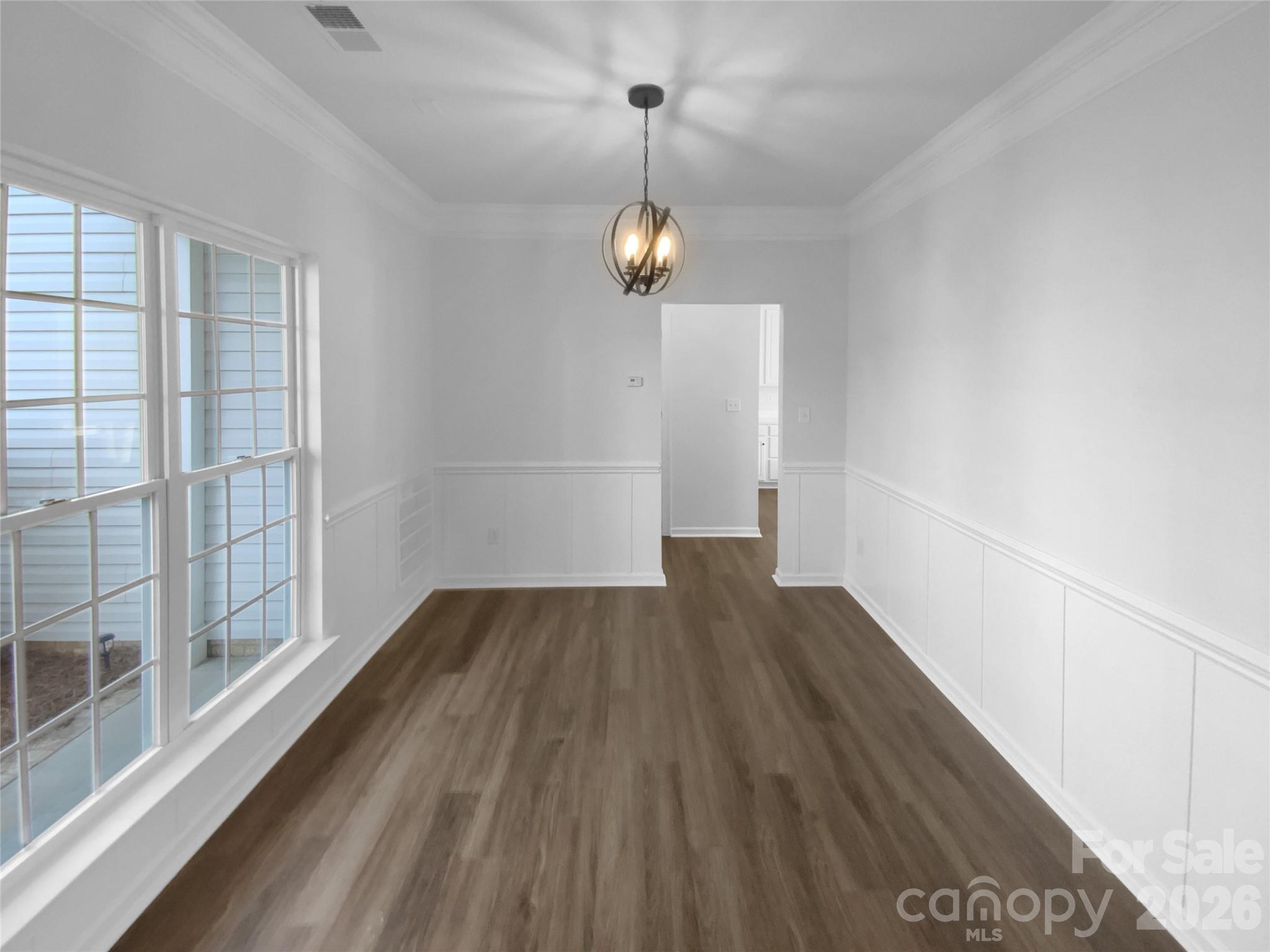 9676 Ravenscroft Lane Northwest Concord, NC 28027 - Photo 11 of 23 a view of a room with wooden floor