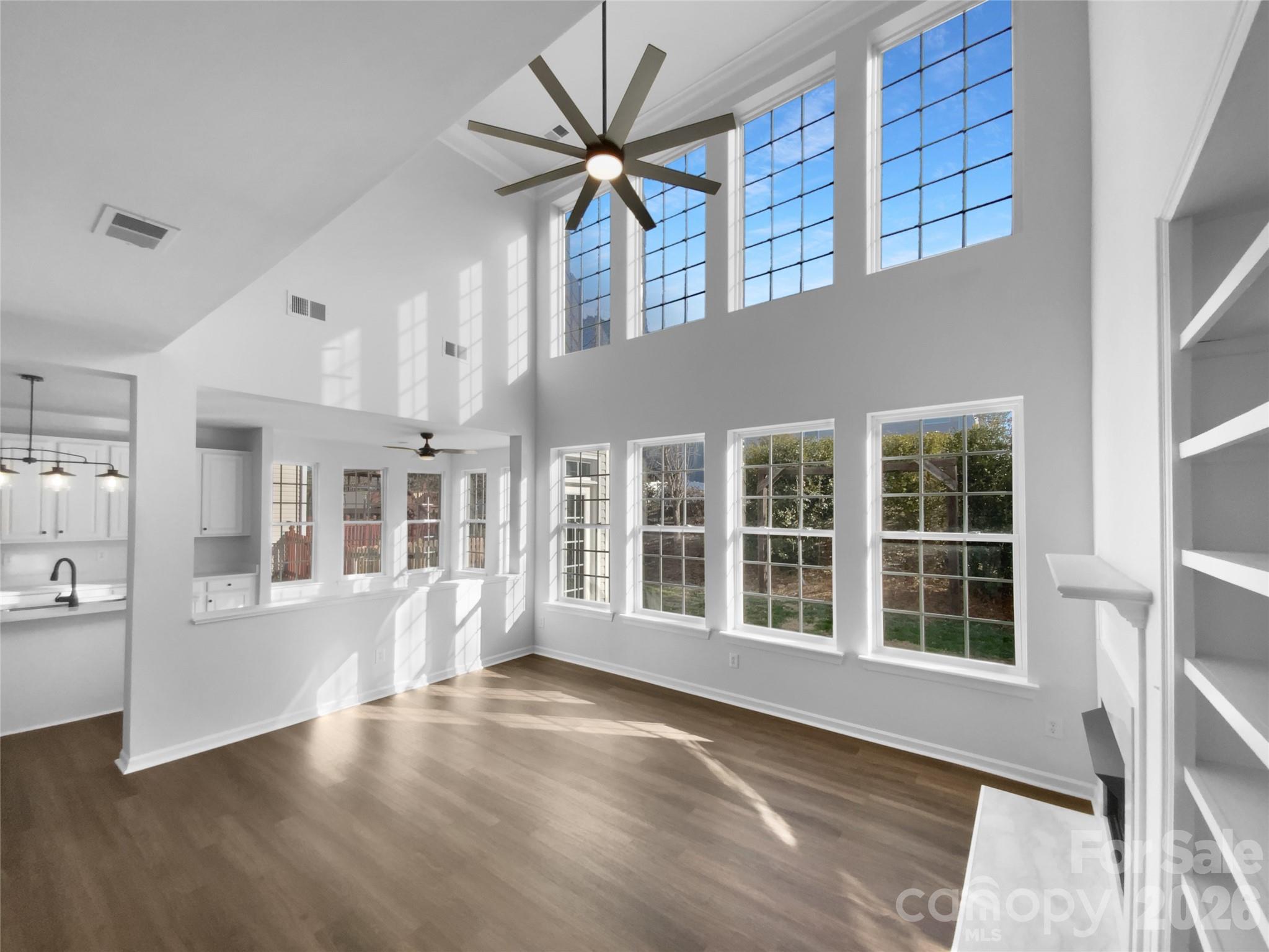 9676 Ravenscroft Lane Northwest Concord, NC 28027 - Photo 9 of 23 a view of an empty room with a window