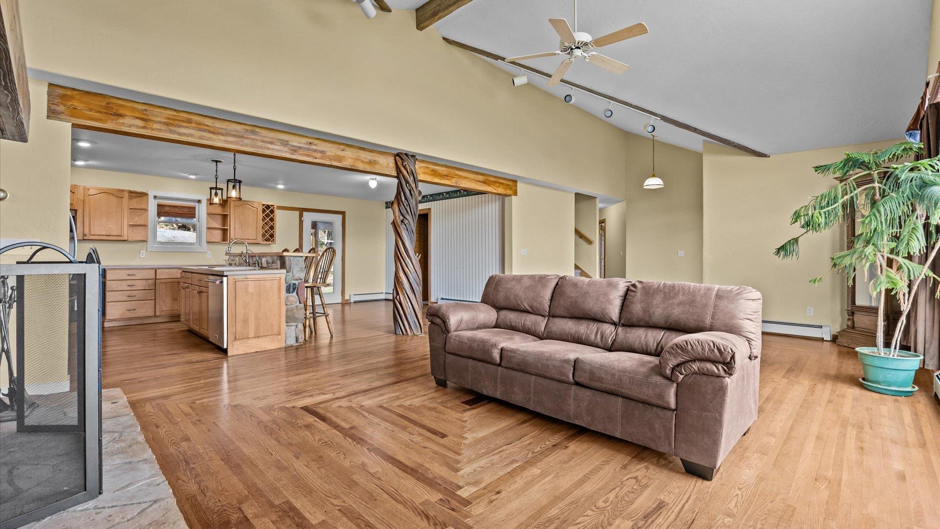 2737 Six Lazy K Road Silt, CO 81652 - Photo 16 of 42 a living room with furniture and a large window
