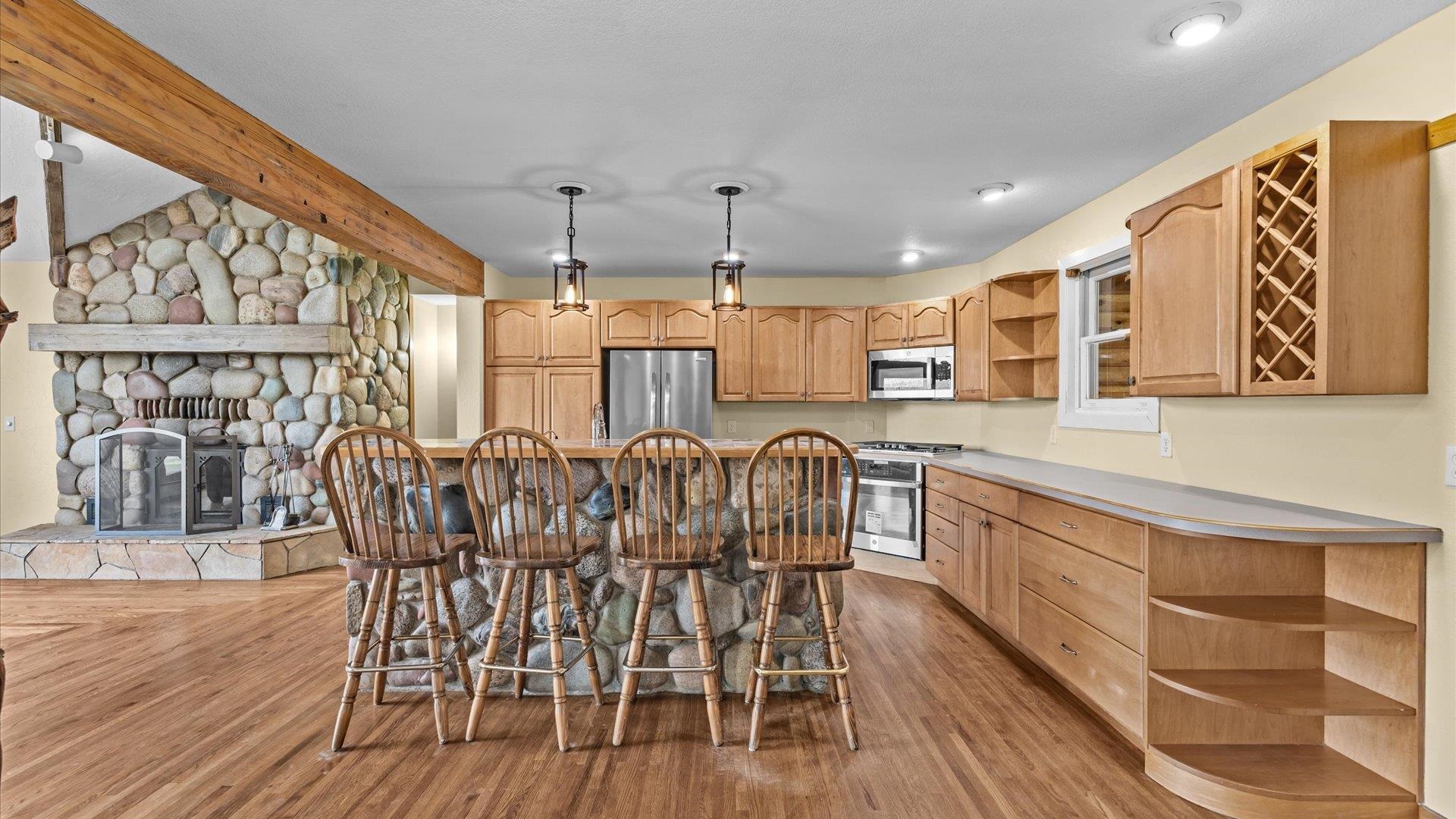 2737 Six Lazy K Road Silt, CO 81652 - Photo 18 of 42 a view of a dining room with furniture window and wooden floor