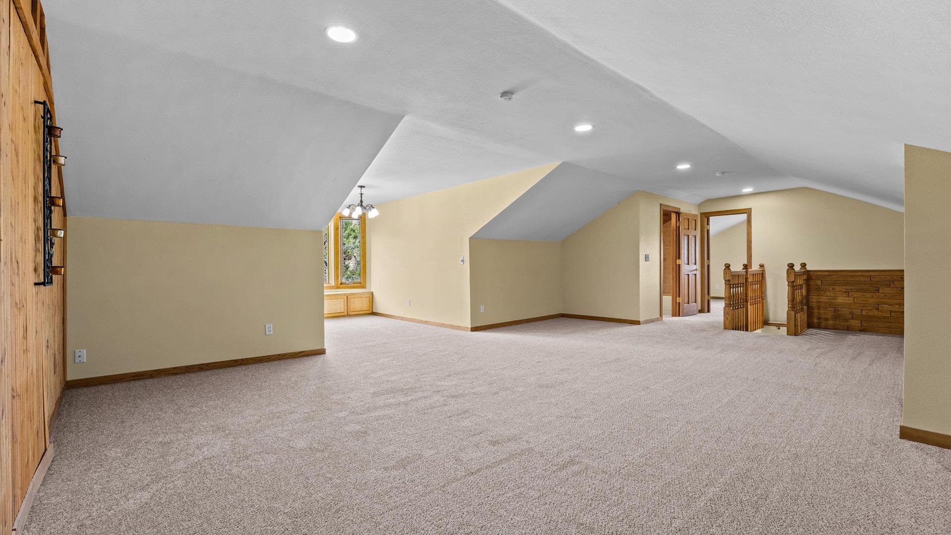 2737 Six Lazy K Road Silt, CO 81652 - Photo 32 of 42 a view of a livingroom with furniture and a ceiling fan
