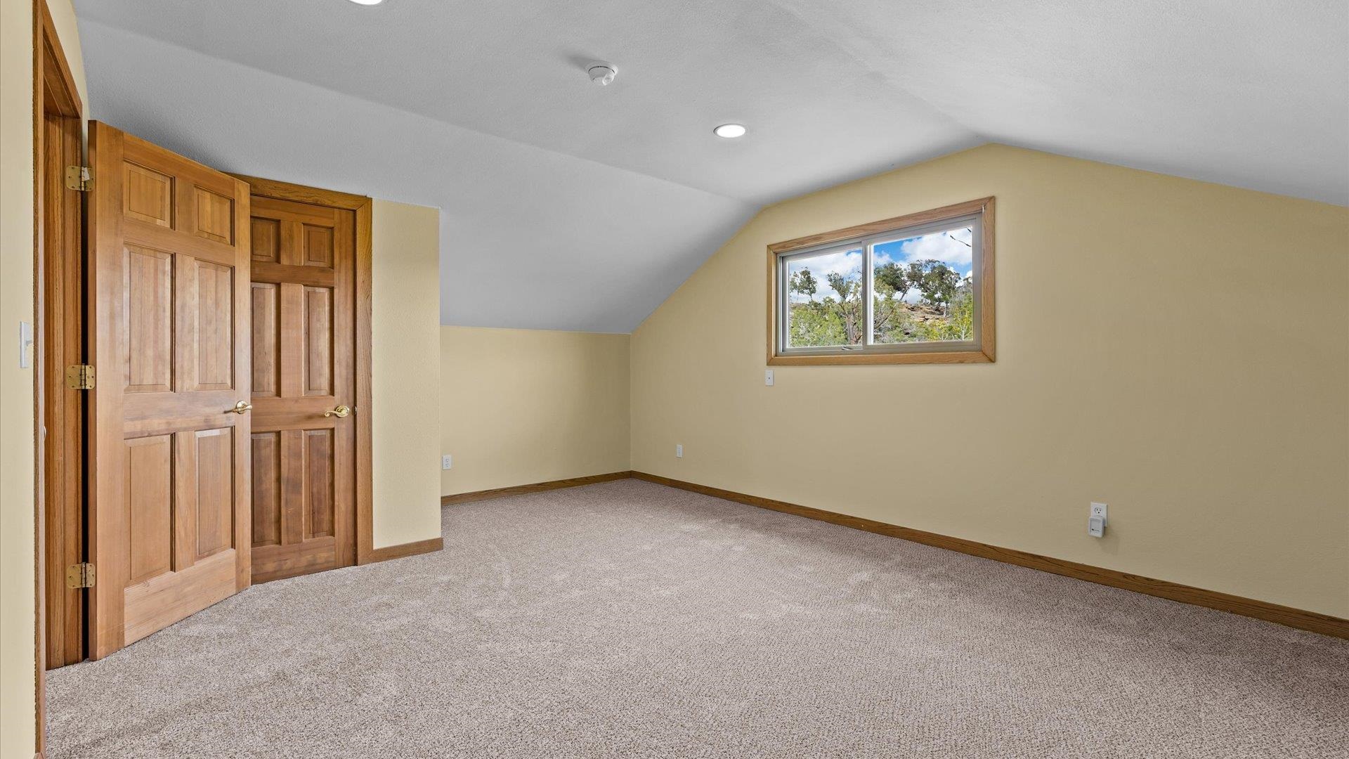 2737 Six Lazy K Road Silt, CO 81652 - Photo 35 of 42 an empty room with windows