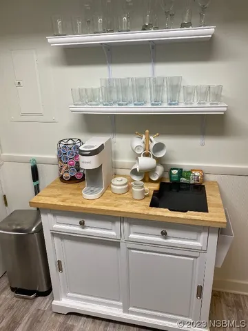 a kitchen with a stove and cabinets
