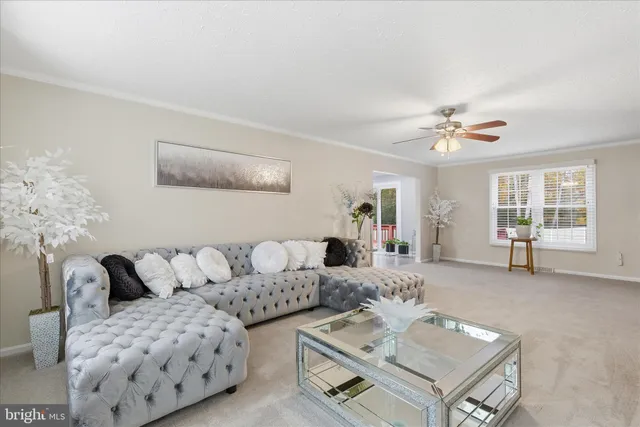 a living room with furniture and window