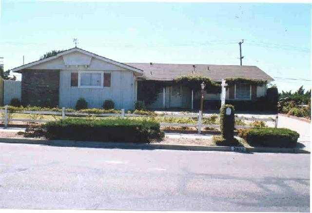 3932 Rigel Avenue Lompoc, CA 93436 - Photo 1 of 1 a front view of a house with a yard