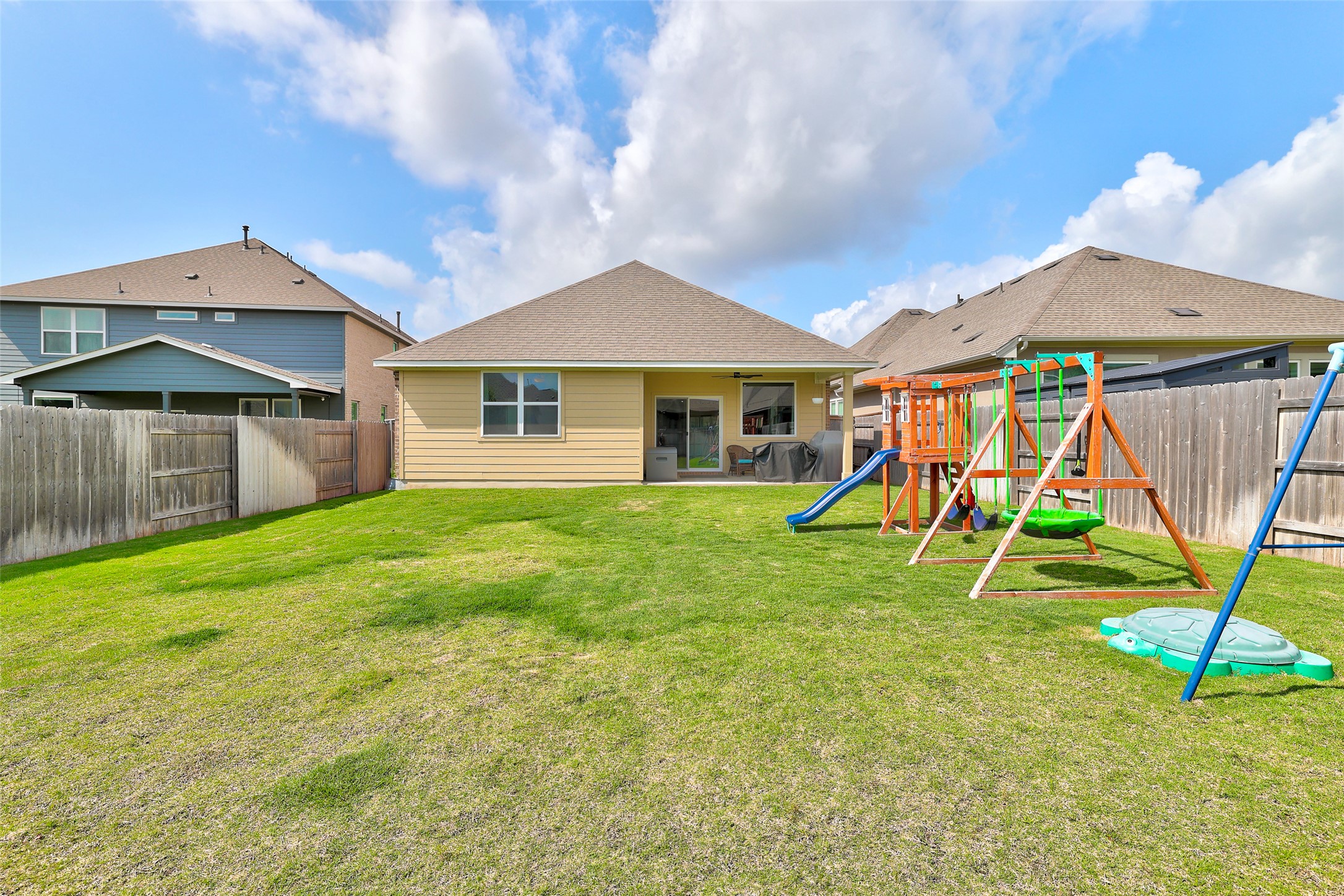 112 Rocking R Court Georgetown, TX 78633 - Photo 34 of 40 A spacious backyard provides ample green space for outdoor activities and entertaining.