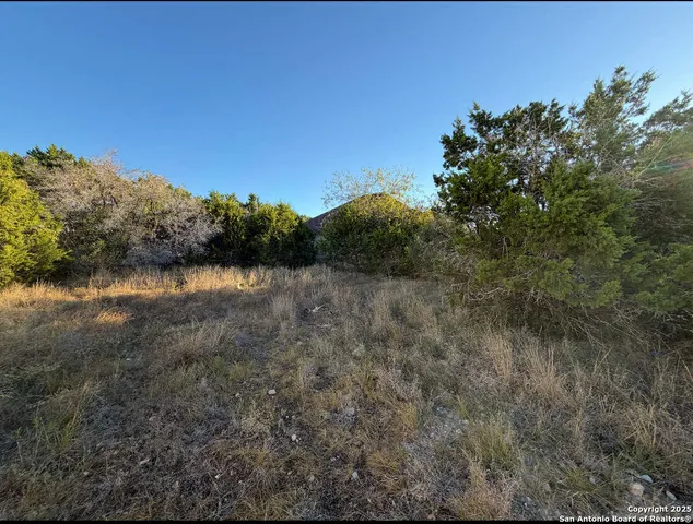 a view of a lake with mountain in the background