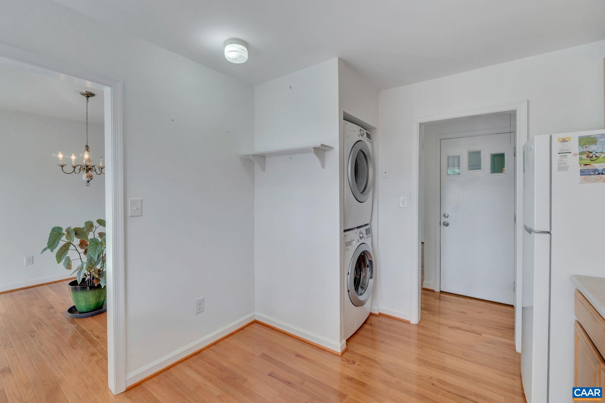 392 Minor Ridge Road Charlottesville, VA 22901 - Photo 16 of 47 a view of a storage and utility room with wooden floor
