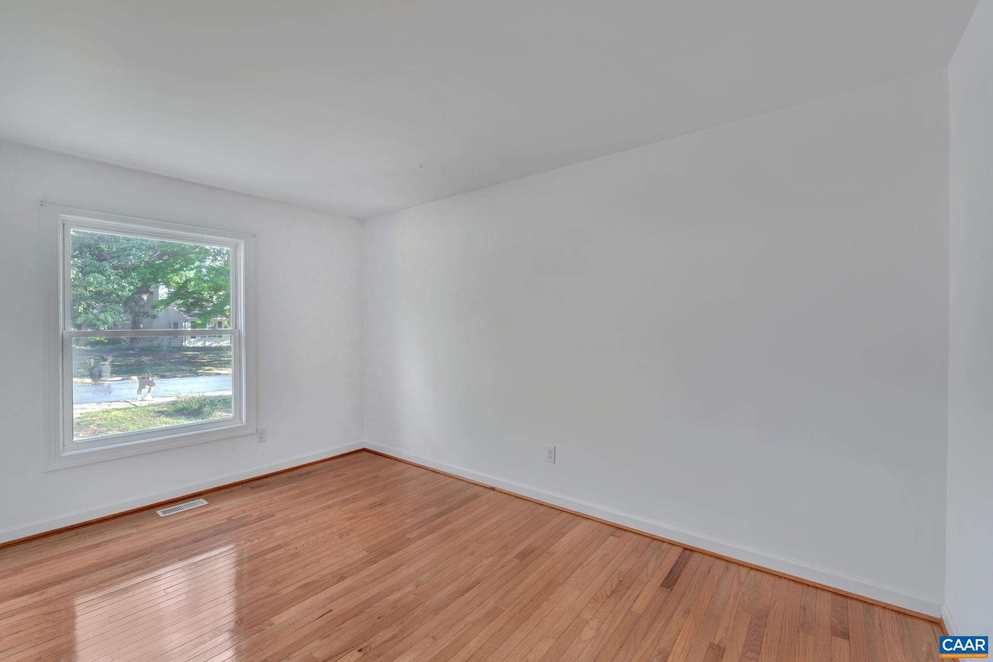392 Minor Ridge Road Charlottesville, VA 22901 - Photo 20 of 47 an empty room with a window
