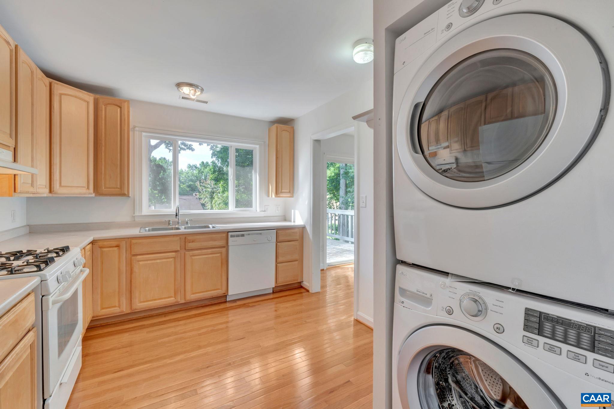 392 Minor Ridge Road Charlottesville, VA 22901 - Photo 26 of 47 a view of a kitchen with washer and dryer