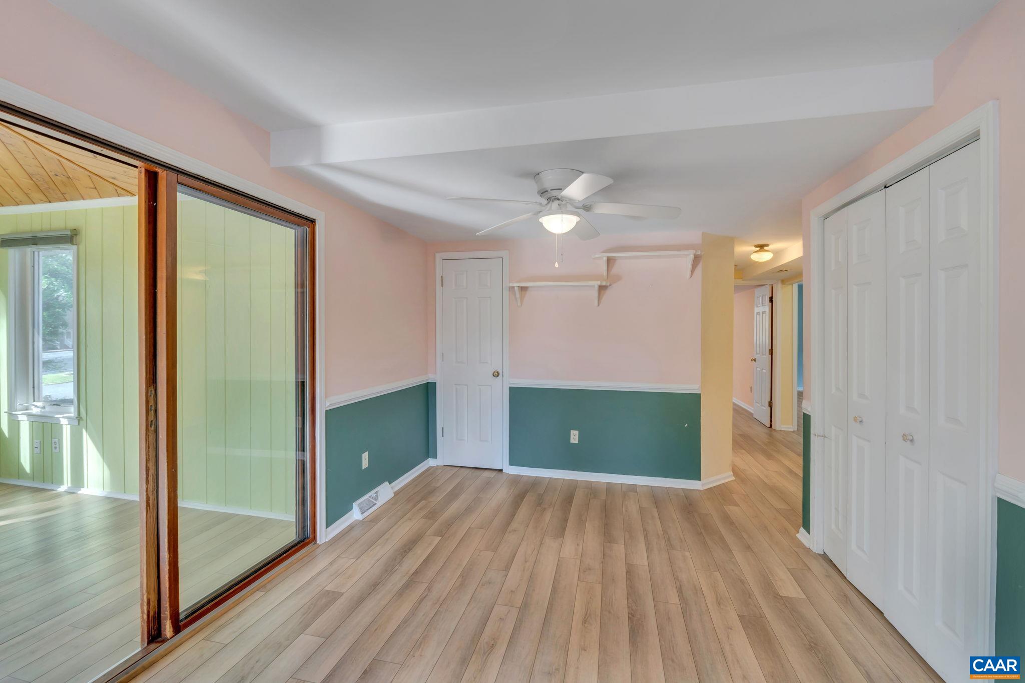 392 Minor Ridge Road Charlottesville, VA 22901 - Photo 37 of 47 wooden floor in an empty room with a window