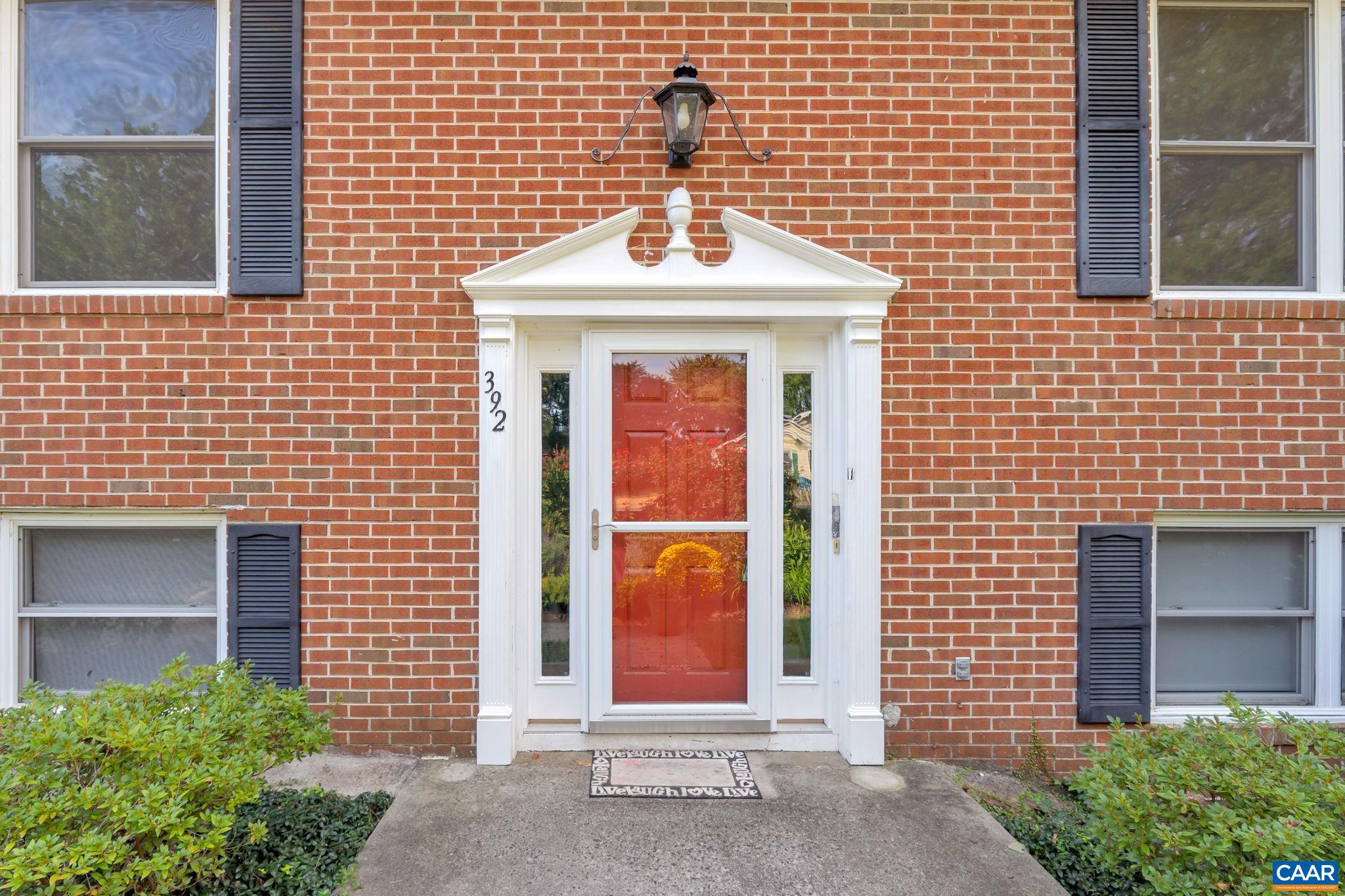 392 Minor Ridge Road Charlottesville, VA 22901 - Photo 4 of 47 a front view of a house with a yard
