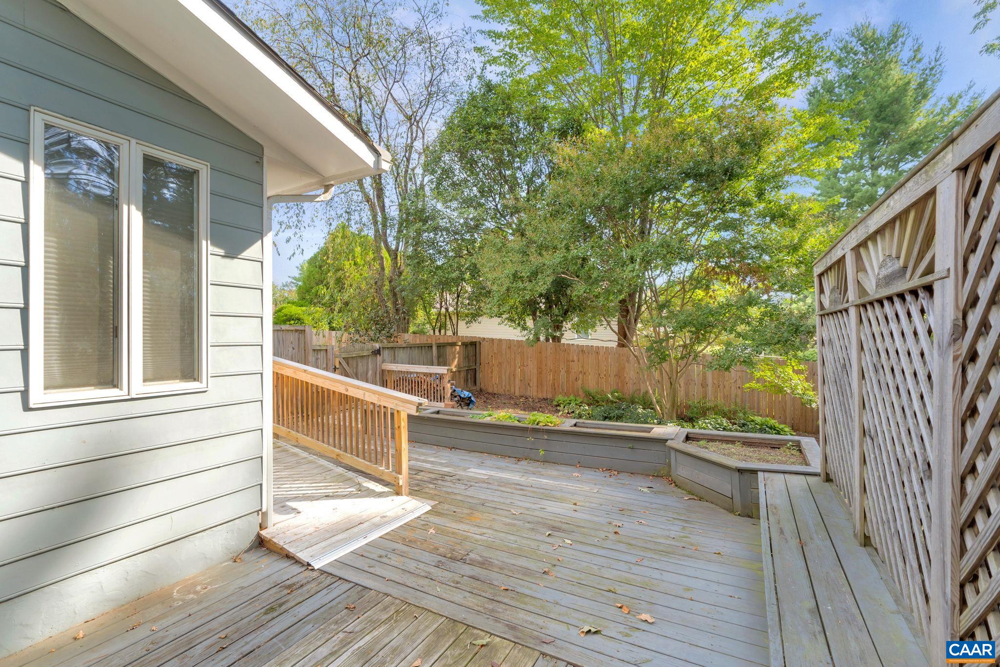 392 Minor Ridge Road Charlottesville, VA 22901 - Photo 44 of 47 a view of a porch with wooden floor and fence
