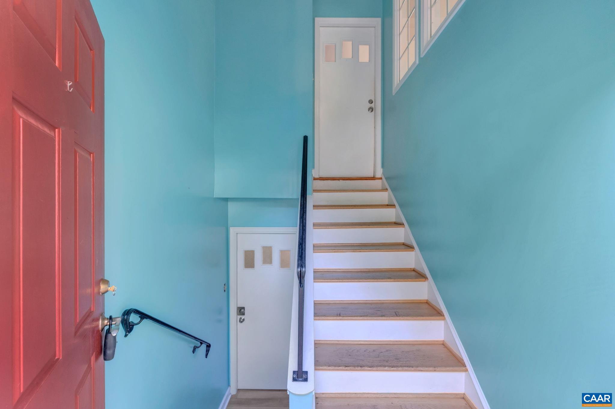 392 Minor Ridge Road Charlottesville, VA 22901 - Photo 5 of 47 a view of staircase with white walls and a window