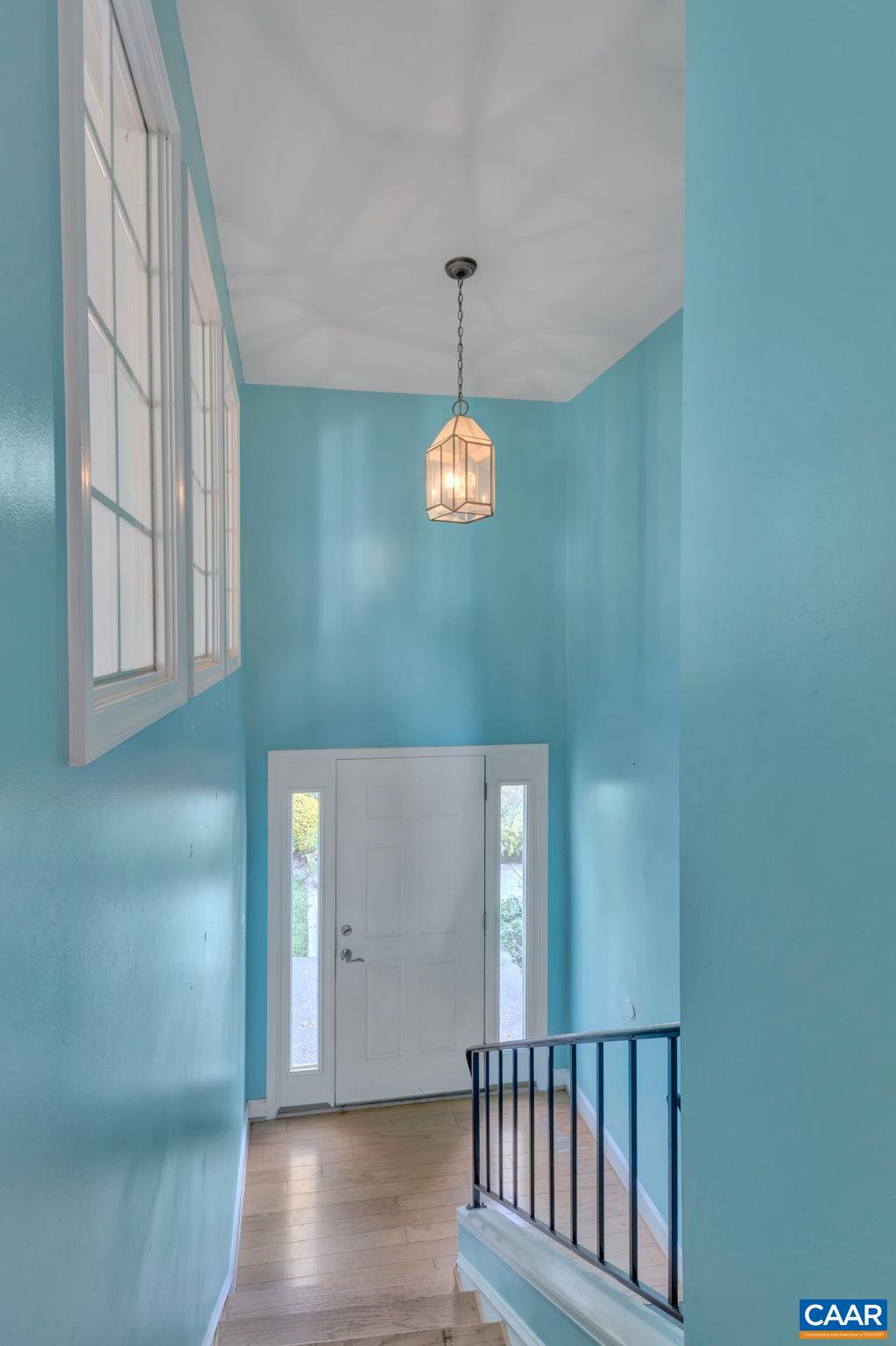 392 Minor Ridge Road Charlottesville, VA 22901 - Photo 7 of 47 a view of a hallway with windows
