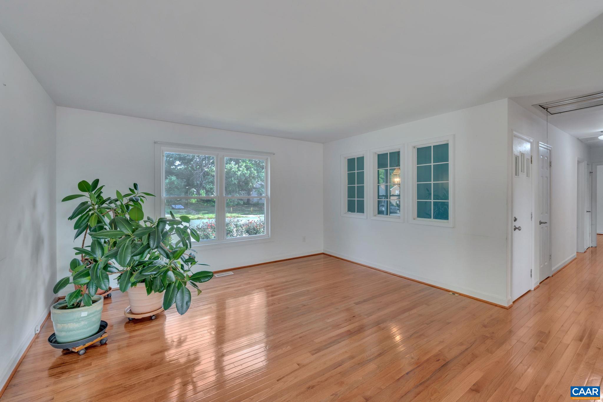 392 Minor Ridge Road Charlottesville, VA 22901 - Photo 9 of 47 a view of an empty room with a window