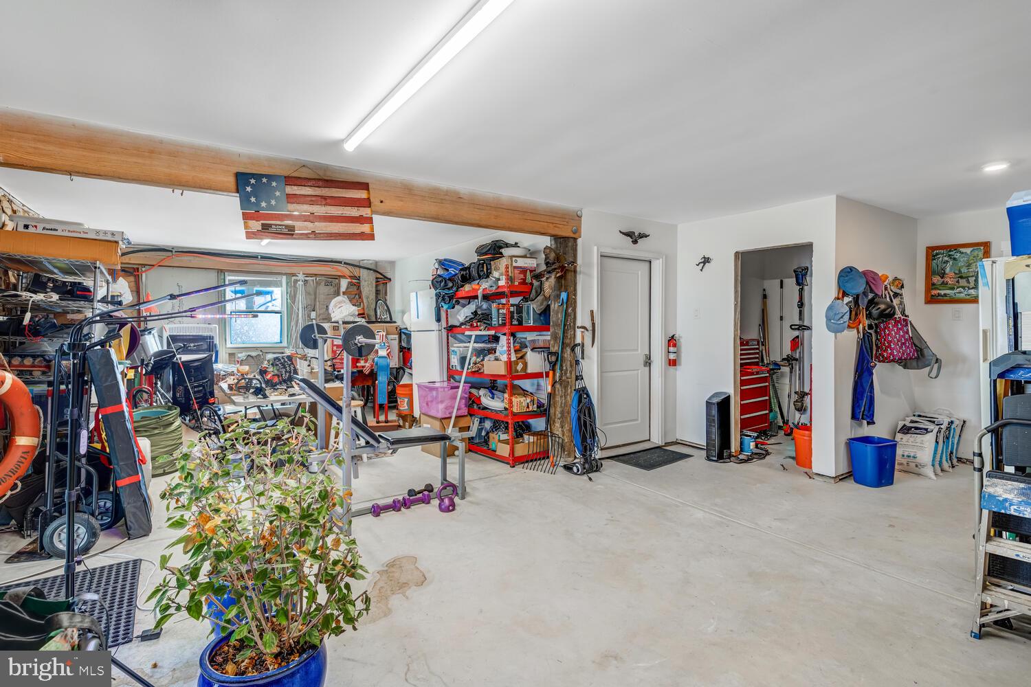 418 Dock Road West Creek, NJ 08092 - Photo 12 of 41 a view of a garage with a bike and car