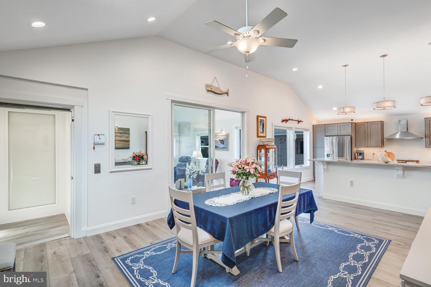 418 Dock Road West Creek, NJ 08092 - Photo 15 of 41 a view of a dining room with furniture and wooden floor