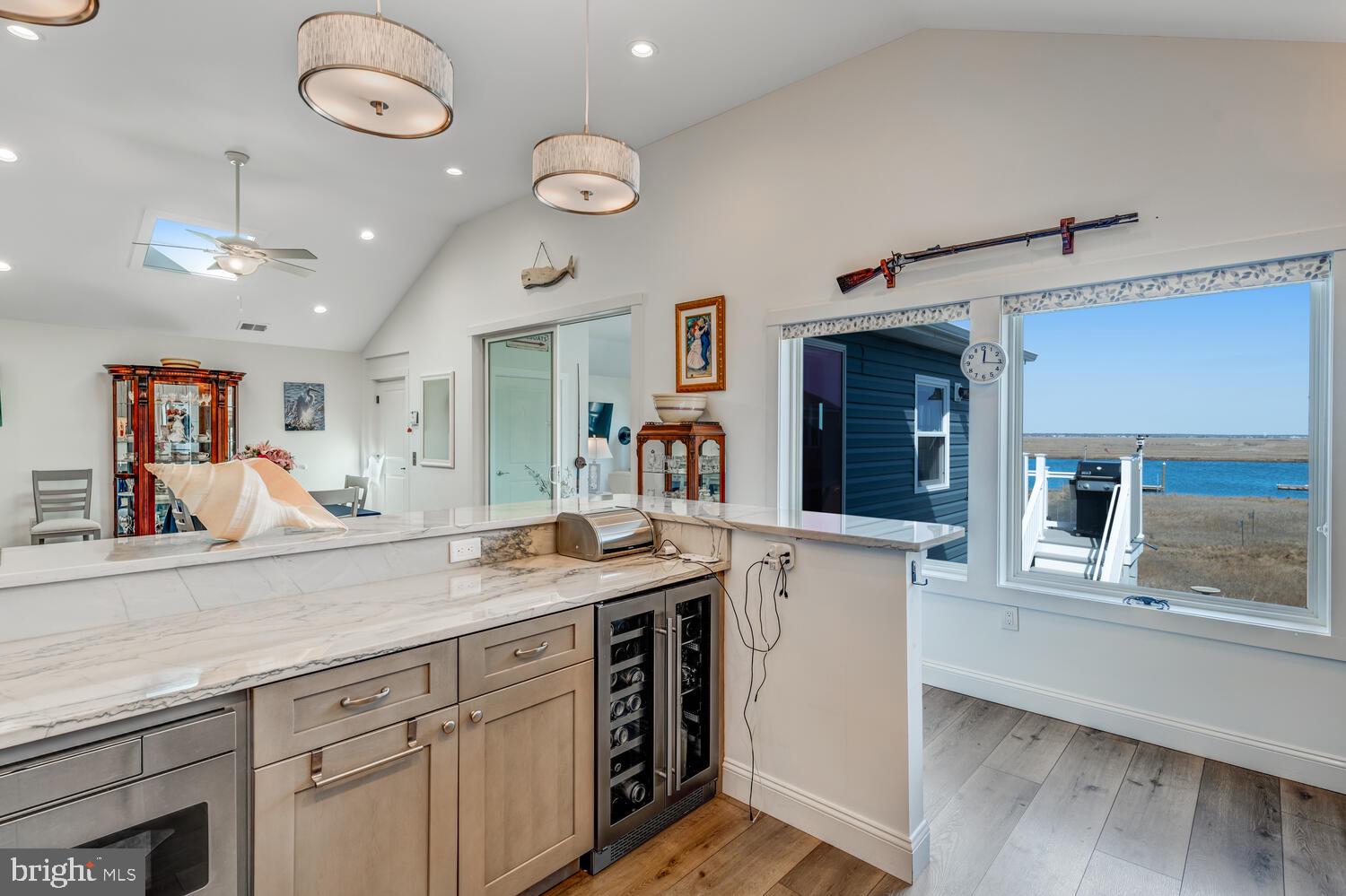 418 Dock Road West Creek, NJ 08092 - Photo 18 of 41 a view of a kitchen area with furniture and a window