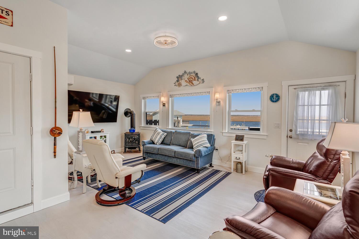418 Dock Road West Creek, NJ 08092 - Photo 19 of 41 a living room with furniture and a flat screen tv