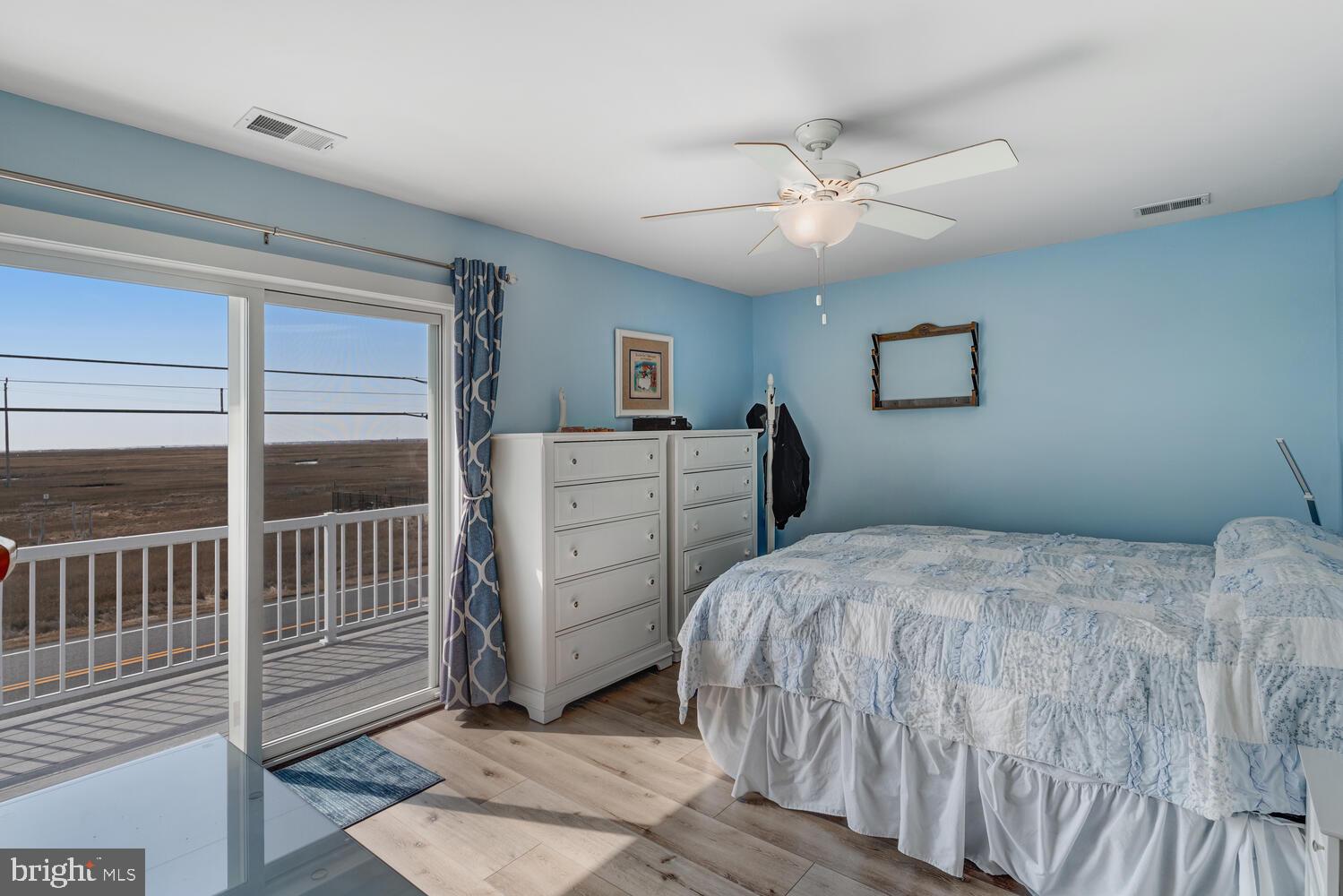 418 Dock Road West Creek, NJ 08092 - Photo 27 of 41 a bedroom with a bed and a window