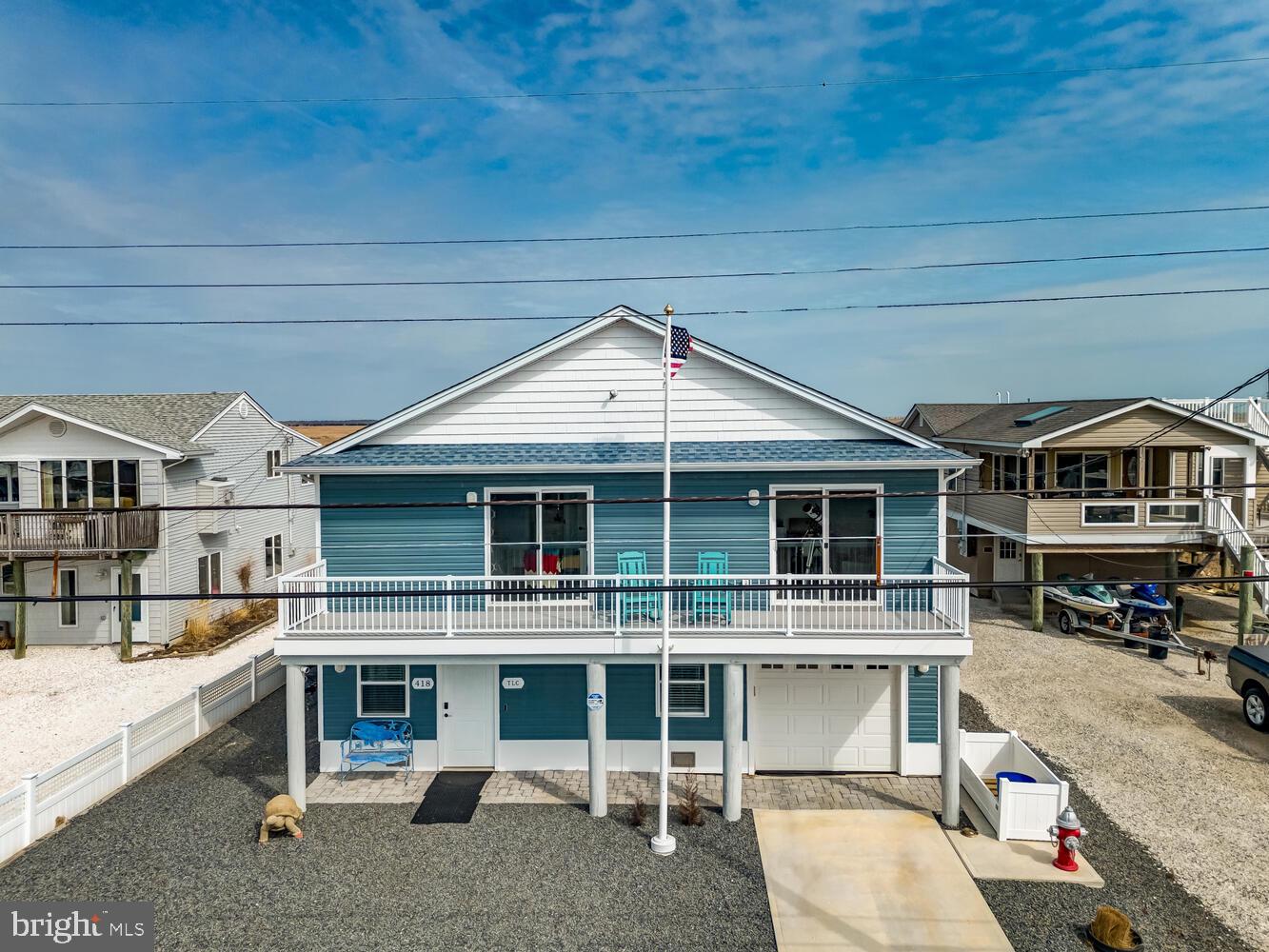418 Dock Road West Creek, NJ 08092 - Photo 34 of 41 a front view of a house with a porch