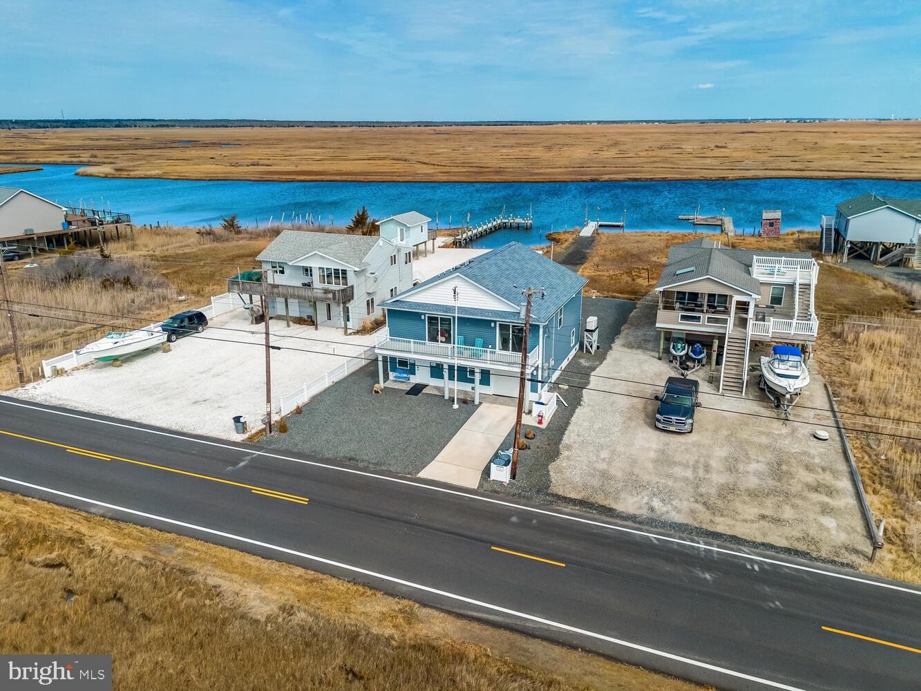 418 Dock Road West Creek, NJ 08092 - Photo 36 of 41 a view of a swimming pool with a lounge chair