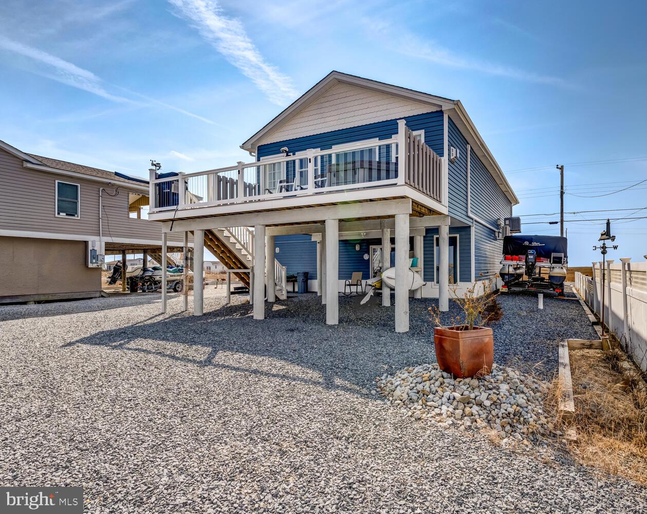 418 Dock Road West Creek, NJ 08092 - Photo 4 of 41 a front view of a house with sitting area