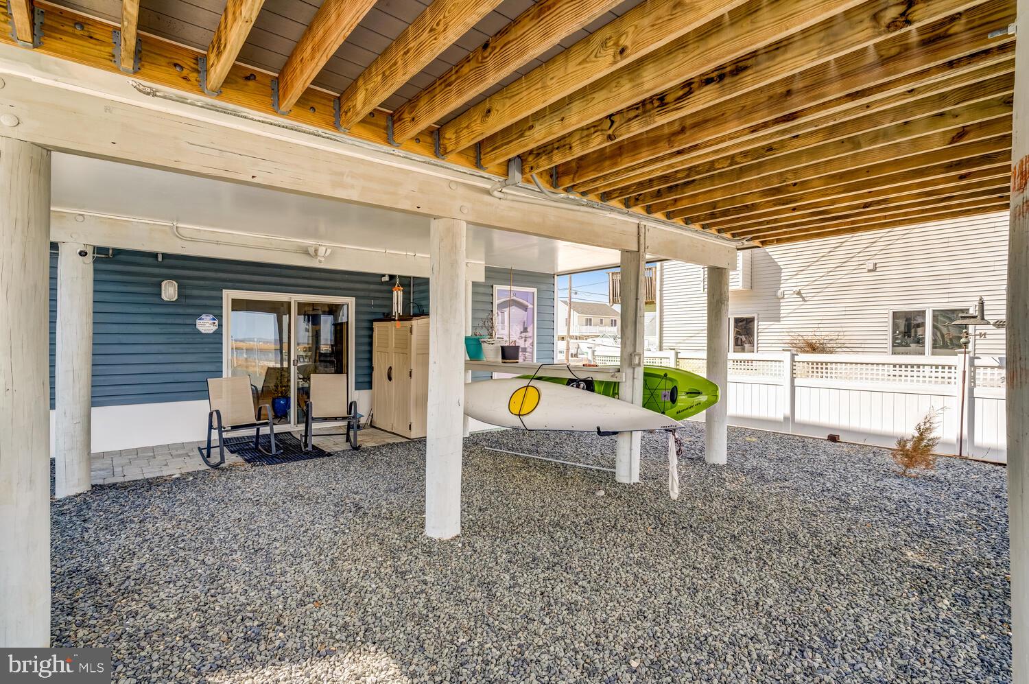 418 Dock Road West Creek, NJ 08092 - Photo 8 of 41 a view of a porch with a table and chairs and a barbeque