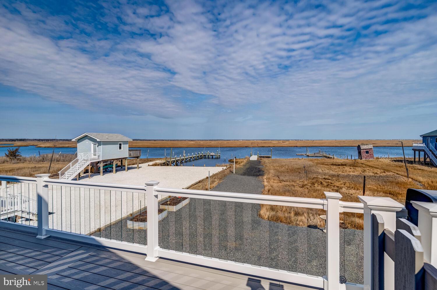 418 Dock Road West Creek, NJ 08092 - Photo 9 of 41 a view of a balcony with an outdoor seating