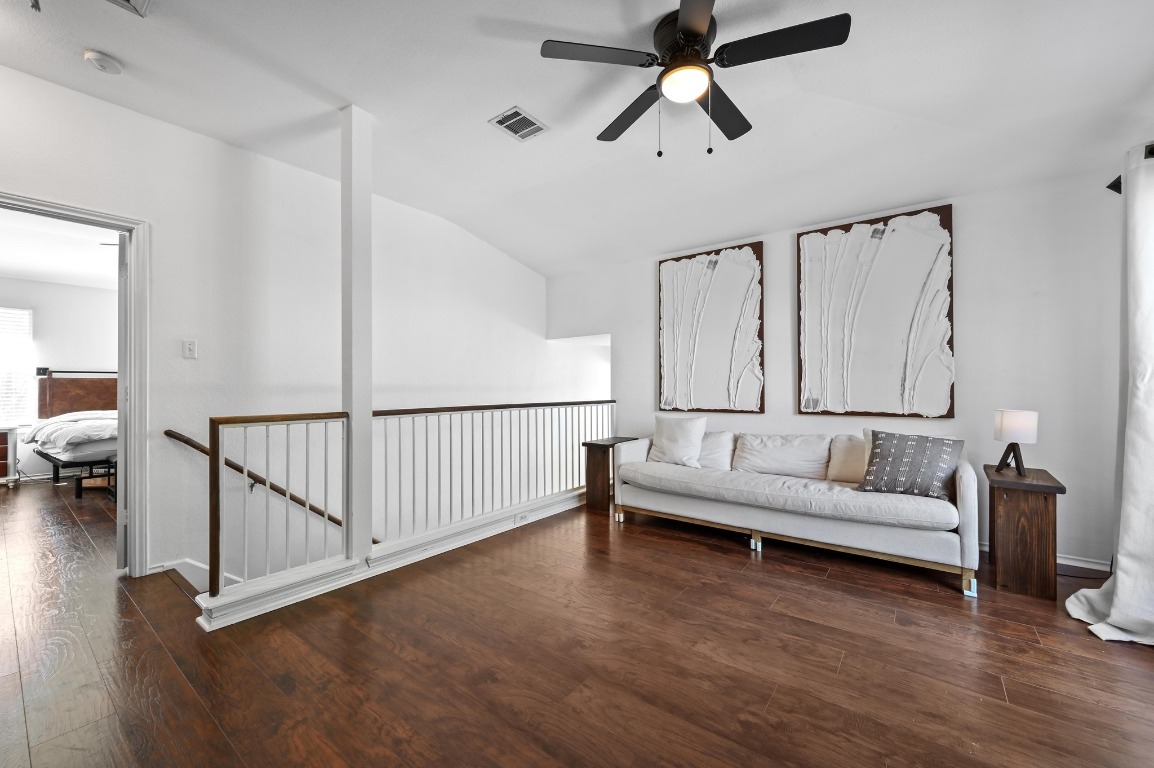 1451 Roxanne's Run Pflugerville, TX 78660 - Photo 8 of 17 a living room with furniture and a wooden floor