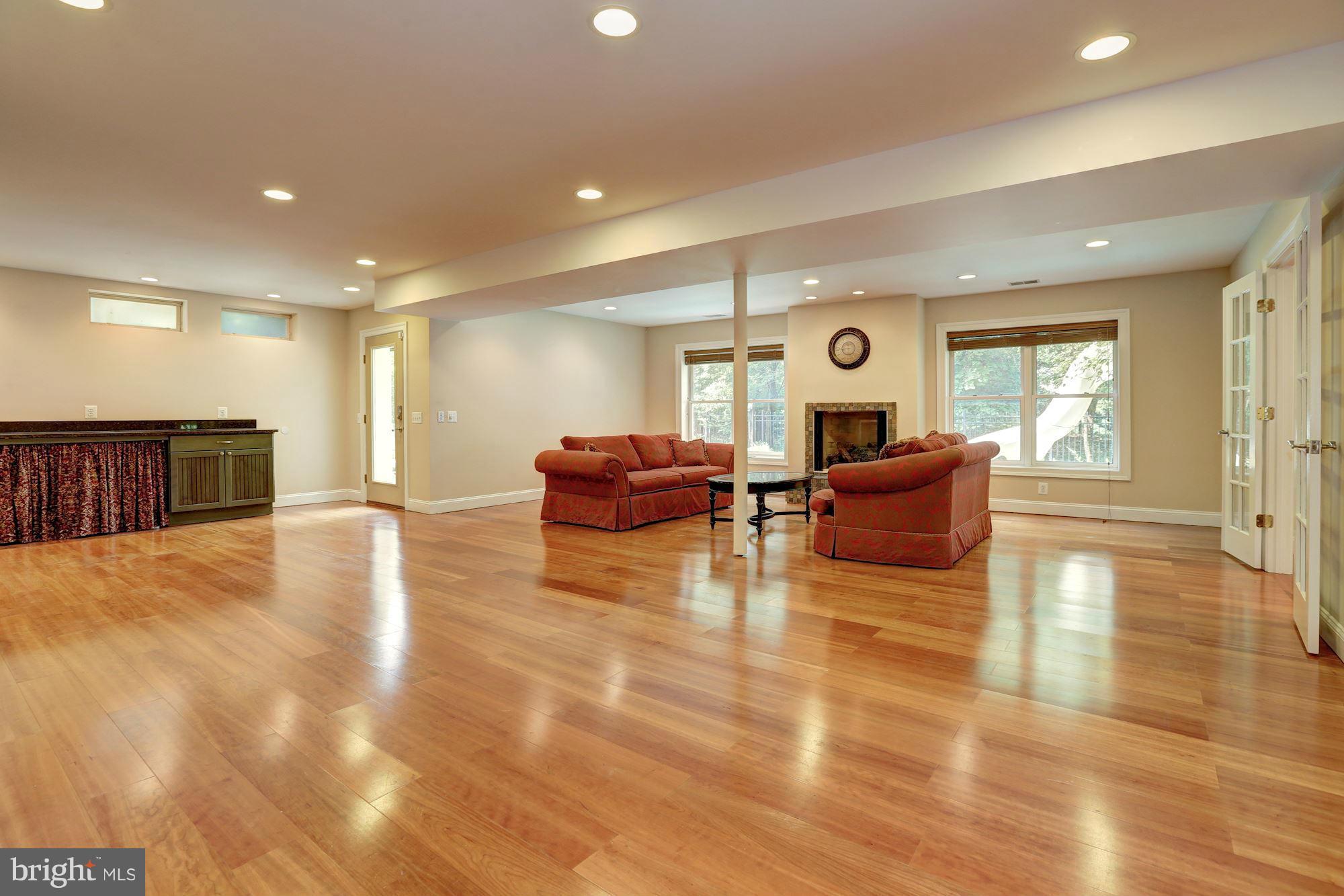 11500 Ridge Mist Terrace Potomac, MD 20854 - Photo 19 of 30 Lower level recreation room