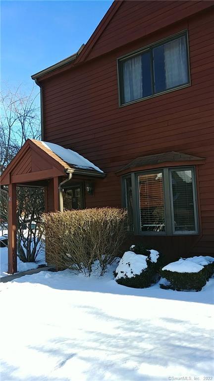 40 Wyndham Landing, Unit 40 Killingly, CT 06239 - Photo 1 of 1 a front view of a house with a yard