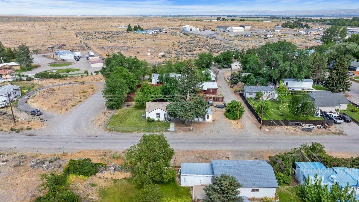 418 South Date Street Shoshone, ID 83352 - Photo 27 of 36 Aerial depiction of a residential area with varied property sizes and established landscaping