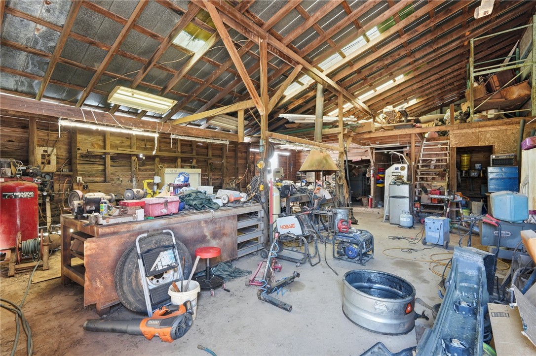 608 Five Forks Road Anderson, SC 29621 - Photo 16 of 43 This spacious outbuilding offers ample workspace and storage, perfect for any project or equipment.