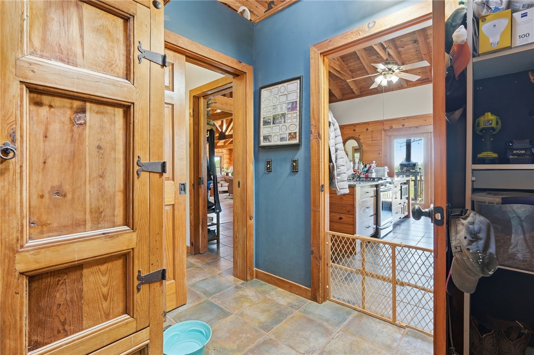 608 Five Forks Road Anderson, SC 29621 - Photo 30 of 43 This interior hallway features beautiful wood doors, offering a glimpse into the home's inviting living spaces.