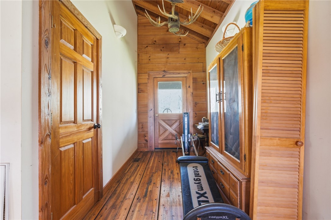 608 Five Forks Road Anderson, SC 29621 - Photo 41 of 43 This inviting hallway features warm wood details, showcasing beautiful craftsmanship and rustic charm.