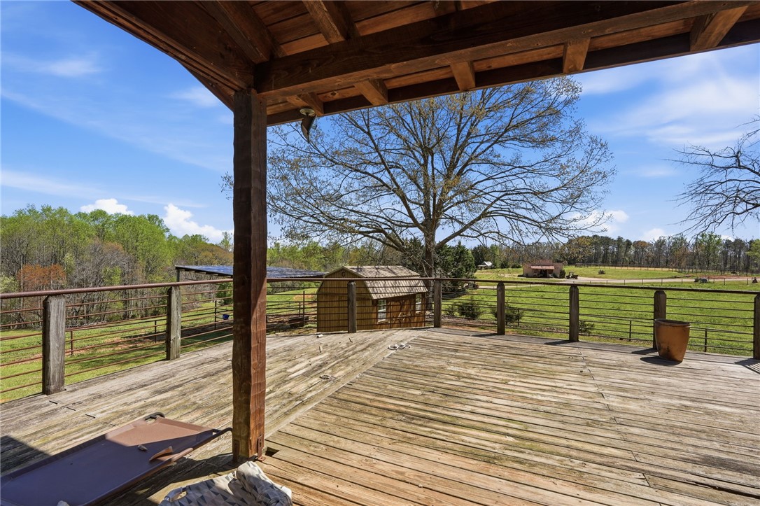 608 Five Forks Road Anderson, SC 29621 - Photo 9 of 43 This spacious deck overlooks serene pastoral views, perfect for outdoor living and entertaining.