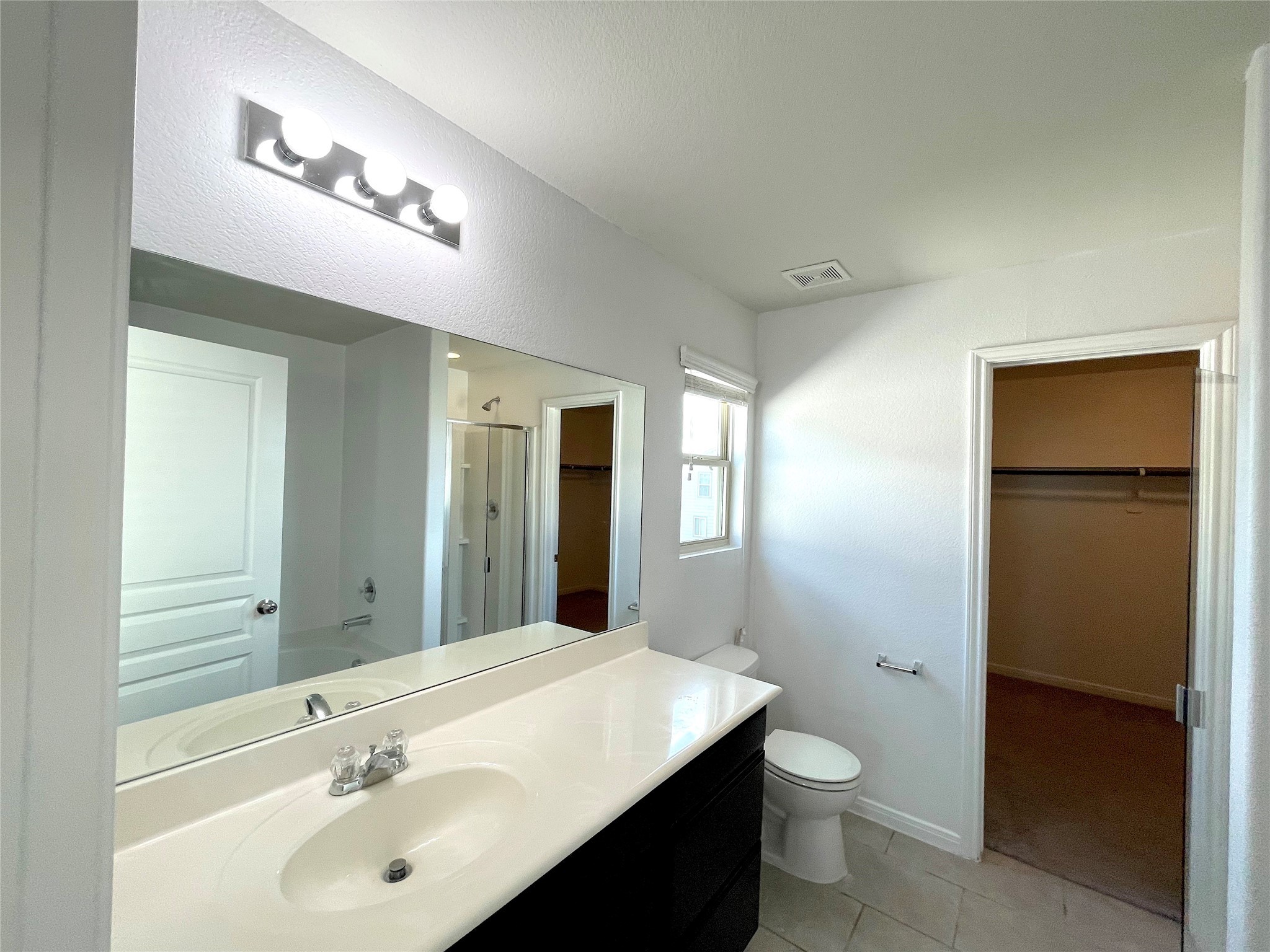 6714 Dayridge Lane Houston, TX 77048 - Photo 13 of 27 a bathroom with a sink and a mirror