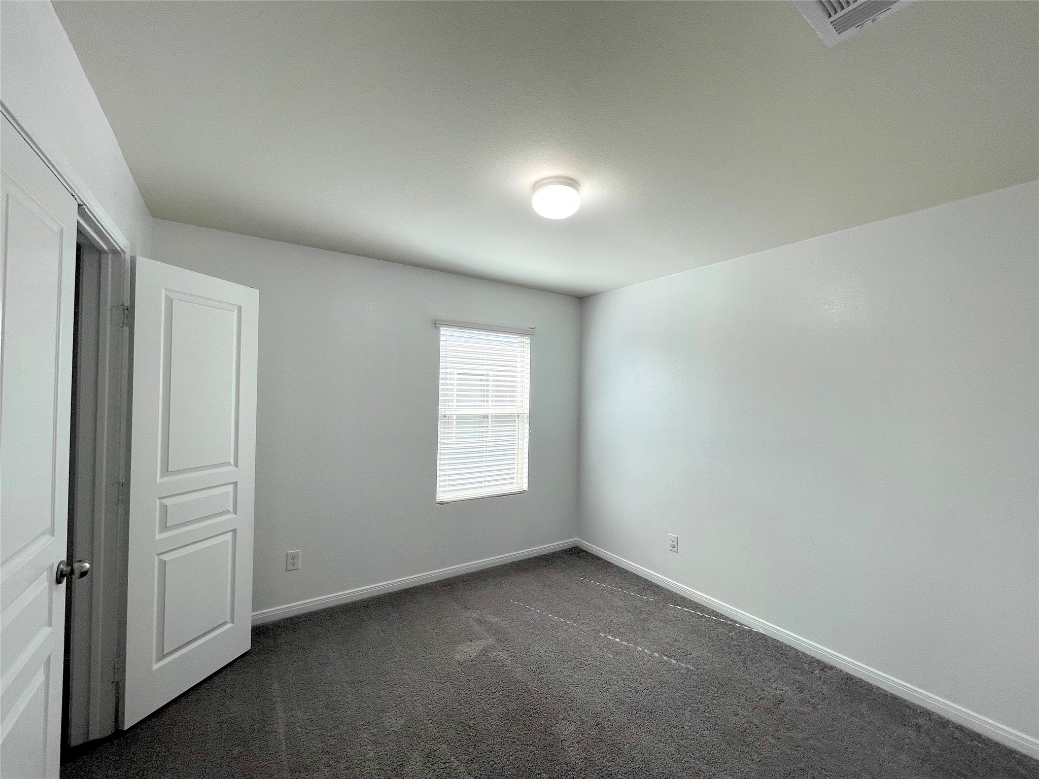 6714 Dayridge Lane Houston, TX 77048 - Photo 15 of 27 an empty room with windows