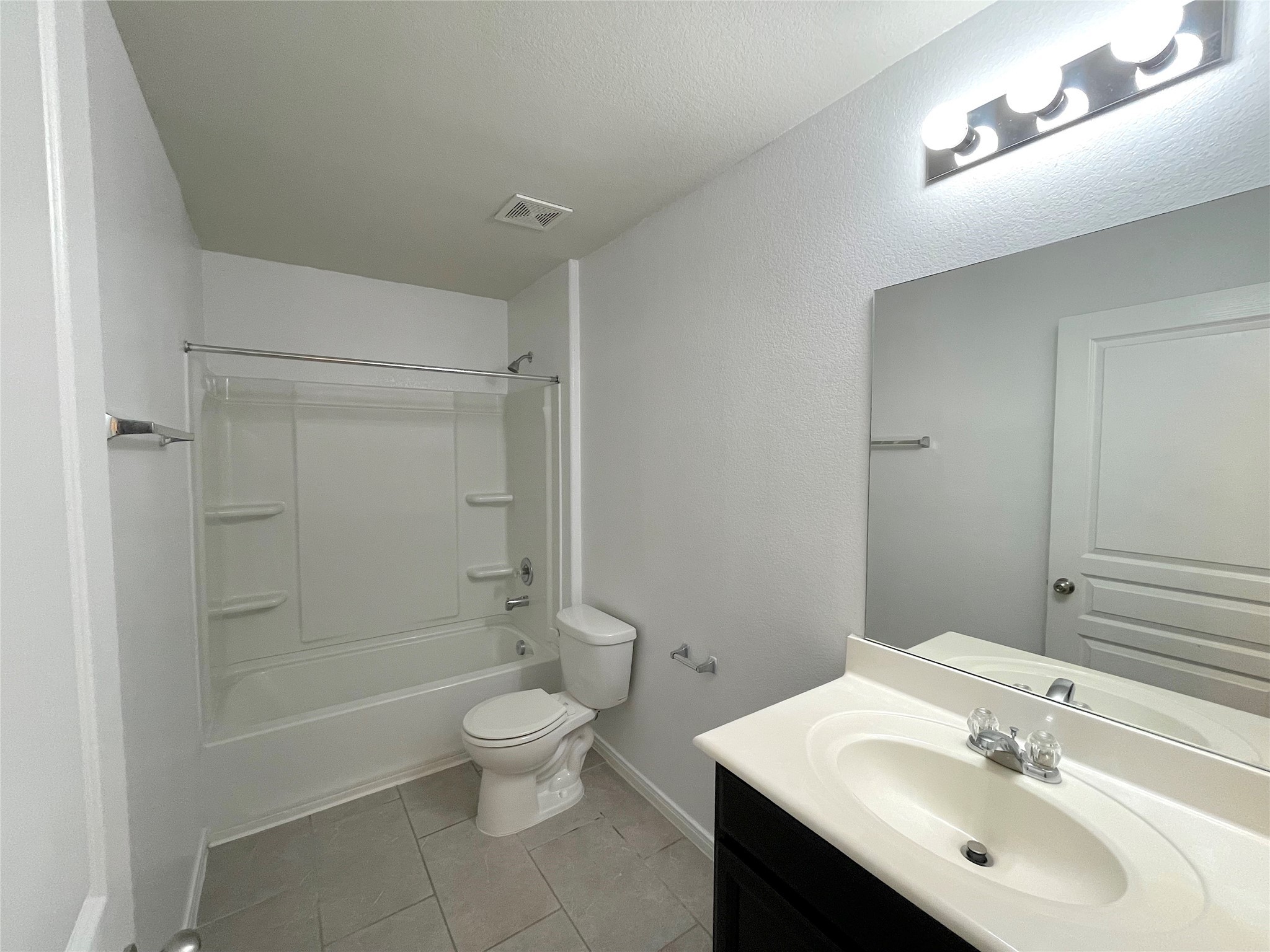 6714 Dayridge Lane Houston, TX 77048 - Photo 17 of 27 a bathroom with a sink toilet and shower