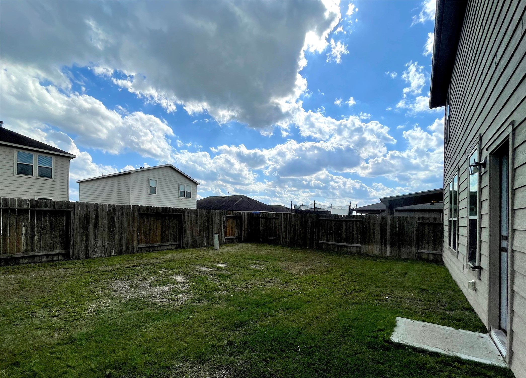 6714 Dayridge Lane Houston, TX 77048 - Photo 26 of 27 a view of a house with a yard