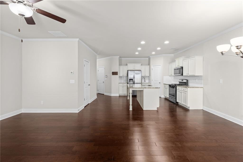 1925 Wheylon Drive Lawrenceville, GA 30044 - Photo 21 of 55 a view of kitchen with wooden floor