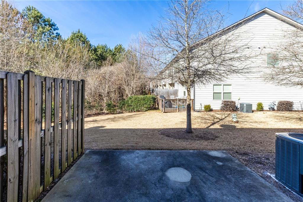 1925 Wheylon Drive Lawrenceville, GA 30044 - Photo 42 of 55 a view of a yard with an outdoor space