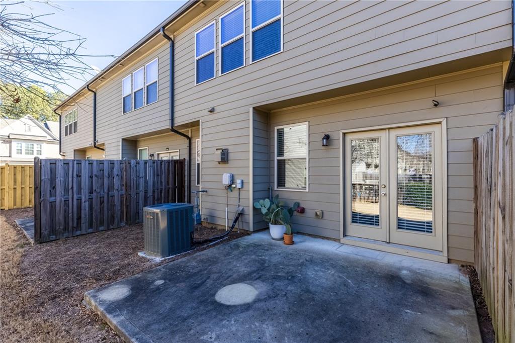 1925 Wheylon Drive Lawrenceville, GA 30044 - Photo 44 of 55 a view of a house with wooden fence