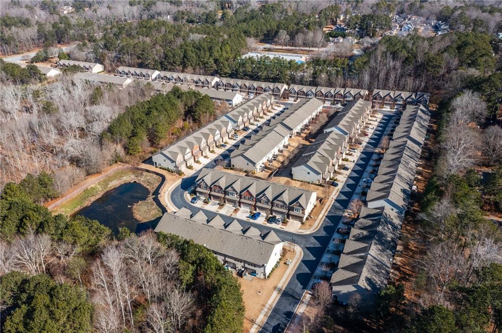 1925 Wheylon Drive Lawrenceville, GA 30044 - Photo 55 of 55 an aerial view of a house with a yard